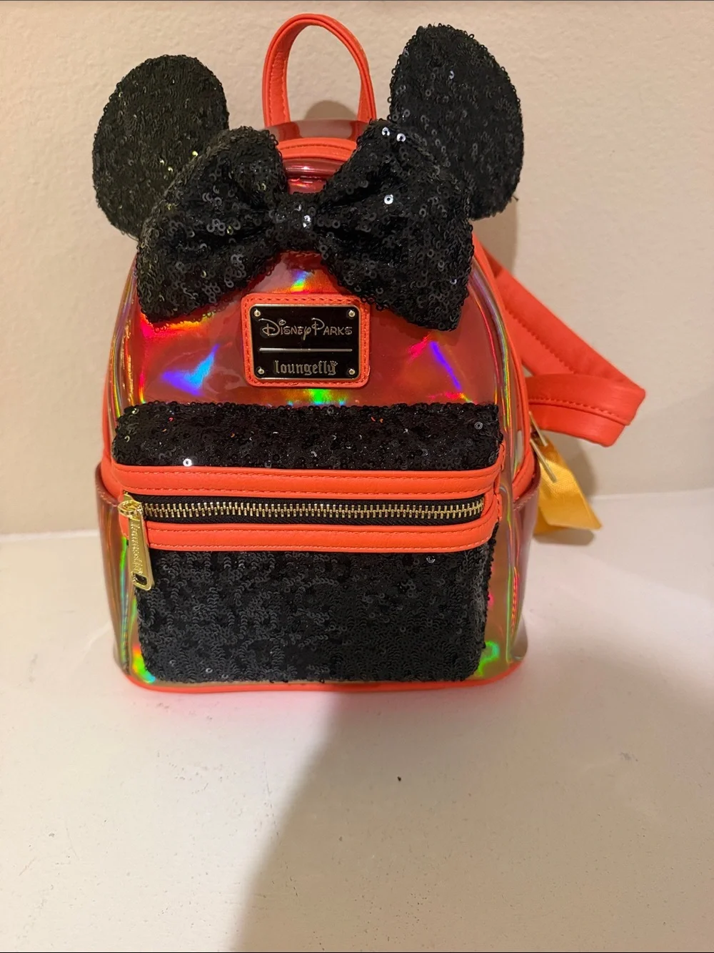 Loungefly Kids Iridescent Orange Mini Backpack with Black Sequin Bow & Ears